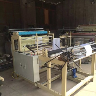 樂發(fā)塑料機(jī)械廠專業(yè)生產(chǎn)電腦紡車制袋機(jī) 塑料制袋機(jī)批發(fā) 量大從優(yōu)，保質(zhì)保量，歡迎咨詢紡車制袋機(jī)